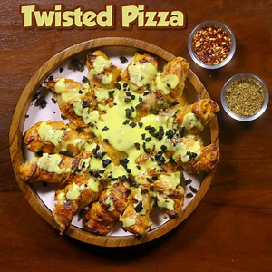 679K views · 1.5K shares | Twisted Pizza at Caffix -The Tech Cafe Your favourite Classic Pizza gets a Cheese Loaded Makeover...! Grab a bite of this unique twisted delight..! #pizza #twisted #delicious #olives #jalapenos #baked #foodporn #foodgasm #foodphotography #foodvideo #foodmovie #foovie #foodfeature #foodmedia #recipes #dishes #tasty #foodies #foodielife #jollyfoodfellow #yahanachakyamiltahai | Jolly Food Fellow | Facebook