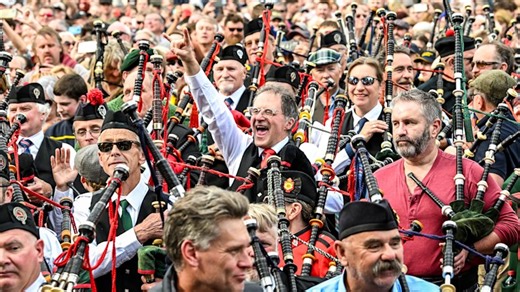 The day bagpipers stormed Fed Square ... with a little help from AC/DC