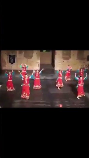 string-controlled puppets dancing gracefully on stage, synchronized on “Tawba Ye Matwali Chaal” .