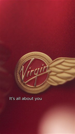 In Premium, breeze through check-in, board early, and unwind in spacious seats with a glass of preflight bubbly. | Virgin Atlantic