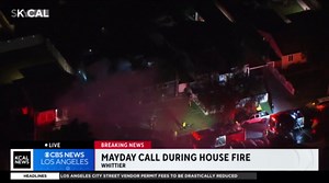Firefighter sends out mayday call while trying to extinguish a home fire