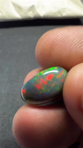 3.3K views · 162 reactions | Amazing multi color Fire smoked opal from Ethiopia  9.10 carat 18x13.5mm | Opal sales | Facebook