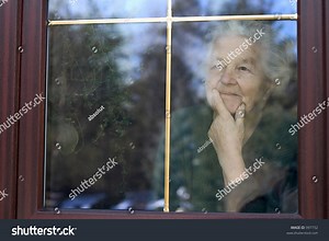 Elderly Woman Looking Through Window Stock Photo 997732 | Shutterstock