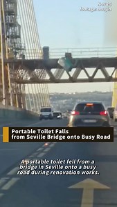 A portable toilet plunged from a bridge during renovations in Seville, landing on a busy roadway. No one was hurt, but traffic was temporarily stopped. #Seville #Accident #Infrastructure #Toilet #Spain | Phoenix TV English