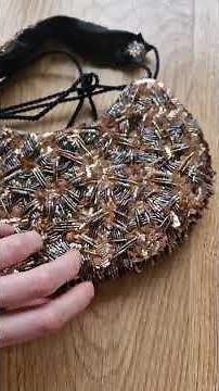 Beaded handbag with python