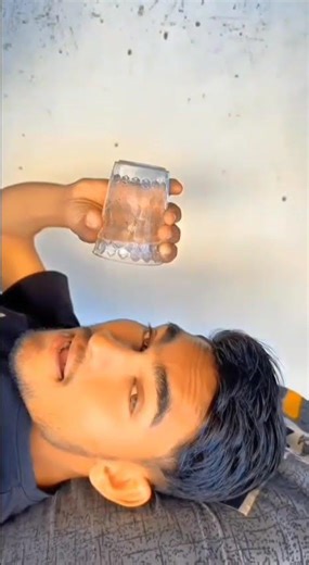 "Coandă effect in action! 😊 Water defying gravity! #Physics #ScienceExperiment"