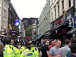 Soho streets packed as people gather to drink in pubs and bars