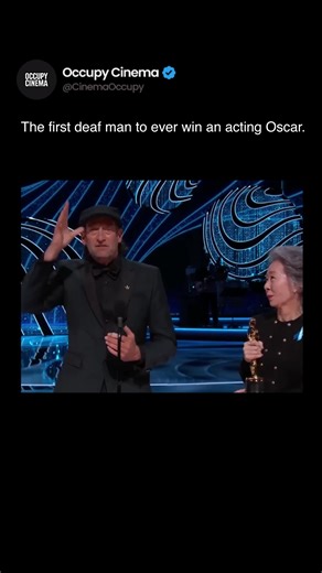 Troy Kotsur delivered his entire Best Supporting Actor acceptance speech in ASL at the 94th Academy Awards. First male deaf actor to win an Oscar. He spoke about his father, who had been the best signer in the family until a car accident left him paralyzed and unable to sign. The tribute was in the language they shared. The audience responded with sign language applause — waving hands. Kotsur won for CODA. His co-star Marlee Matlin was the only previous deaf Oscar winner. Kotsur's performance in