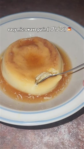 🍮Another microwave mug recipe, I hope u all enjoy!🍮 ~ Recipe in captions ~ In a microwave safe mug: 10g white sugar 3g water mix microwave until it becomes a golden color. set aside In a separate microwave safe bowl: 150ml of milk microwave until slightly warm 1 egg vanilla extract 1 tbsp of maple syrup or honey mix gently strain the mixture into the caramelized sugar mug. loosely cover the mug with plastic wrap and poke holes to create ventilation. microwave for 6:00 minutes at 200W or power 