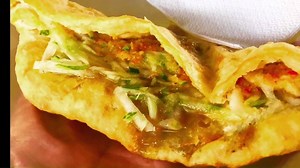 14K views · 565 reactions | Enjoying an Aloo Pie with the full works in Trinidad and Tobago. Full recipe @ CaribbeanPot.com | Caribbean Pot | Facebook