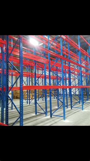 Pallet racking is the most commonly used and standard heavy-duty storage racking system, specifically designed for storing palletized goods, allowing for direct forklift access. Key Features • Structure: Uprights beams, fully assembled, height and number of layers are freely adjustable. • Access: 100% picking, every pallet can be directly forked, regardless of location. • Load Capacity: Single beam typically supports 1-5 tons. • Height: Standard 3-10 meters, high-bay racking can reach over 15 me