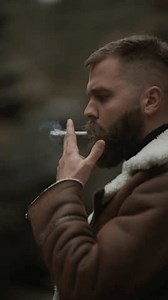 Bearded Male Brown Leather Jacket Smoking Stock Footage Video (100% Royalty-free) 3754559625 | Shutterstock