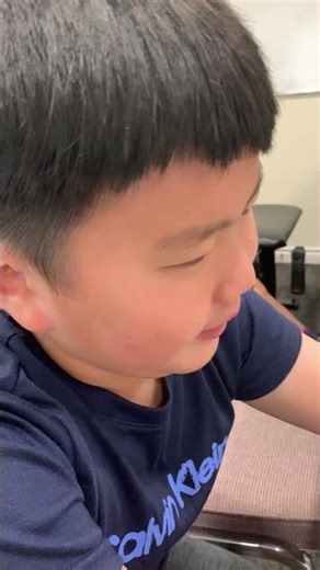 Corwin explaining his python game, the character he created has to collects as many coins as he can!