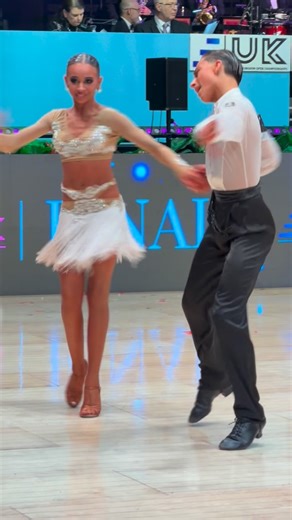 Nancy Russo on Instagram: "You’ve just finished your solo final and right after you’re dancing the couple final, the last jive dance, you’re exhausted but you can’t give up!!!!!!! 🔥✨ @ukopen.international . . MY SHOES : @soulpassion_dance_shoes . MY DRESS : @tufano_luxury . . . . . . . . #couple #final #uk #jive #nancy"