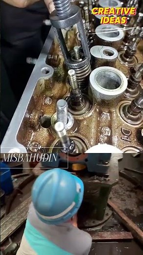 “Removing a valve spring from the cylinder head using a valve spring compressor tool. #automobile