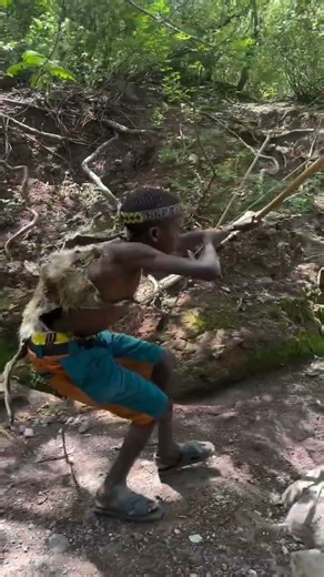 African Tribal Children Trained in Traditional Hunting