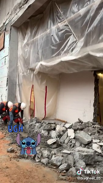 Demolition Action: Construction Workers at Work