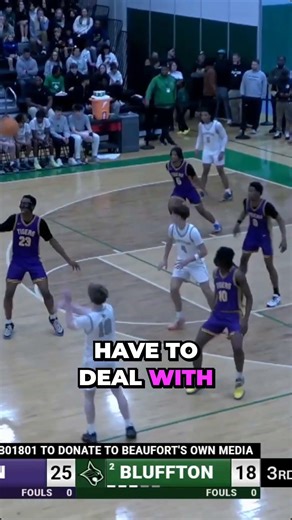 Can Skinner outsmart the 6'7 giant? 🏀💥 Watch this epic matchup! #Basketball #Hoops