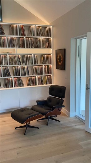 This music room offers a sanctuary for a lifelong music collector. The goal here was to create storage for an extensive record collection whilst keeping the records themselves as the focal point. | Martin Howlett Furniture | Facebook