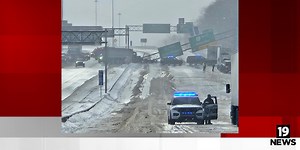 Overhead sign falls across I-77 after dump truck crash