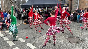A display of Highland Sword dancing to the tune "Wake Me Up" by students of the Brenda Gordon School of Dance in Huntly Square on Saturday 6th May 2023. This was part of the Huntly Spring festival and 75th anniversary celebrations by Huntly & District Pipe Band on the Coronation weekend. | Scotland Online