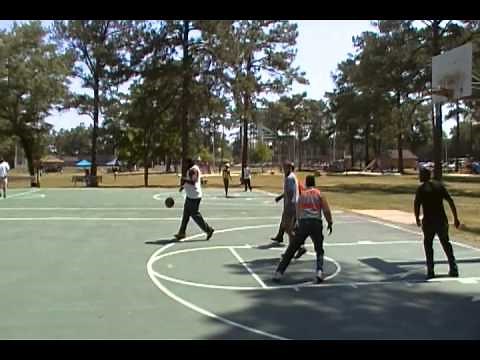 Old men playing Basketball.