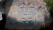 New Zealand Maori Stone Carvings At Taupo Lake. Slow Zoom In On Face.