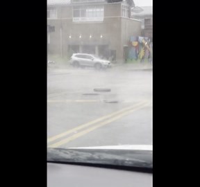 Water Bursts From Chicago Sewer During Heavy Rain