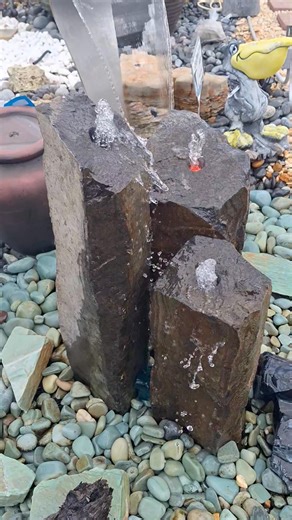 Basalt is said to have healing properties and can help reduce stress and anxiety! Combine that with the proven benefits of moving water and its the perfect relaxation fountain for your yard! #basalt #fountain #landscaping #waterfeature #tampabaypondsandrocks | Tampa Bay Ponds & Rocks