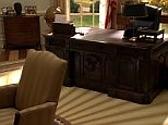 Presidential Seal and the Resolute Desk in the Oval Office