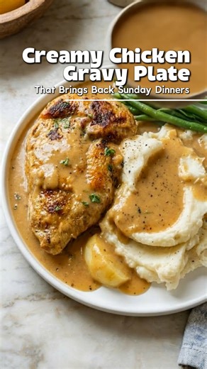 🍗 Creamy Chicken Gravy Plate That Brings Back Sunday Dinners (Old-School Comfort Food, Better Than Takeout) tender chicken smothered in creamy, peppery gravy poured over fluffy mashed potatoes — this is the kind of plate that feels like grandma’s kitchen on a sunday afternoon 🤎 pure comfort food magic. ⏱️ recipe details prep time: 15 minutes cook time: 30 minutes servings: 4 🧾 ingredients chicken 4 boneless chicken breasts or thighs 1 teaspoon salt ½ teaspoon black pepper ½ teaspoon paprika ½
