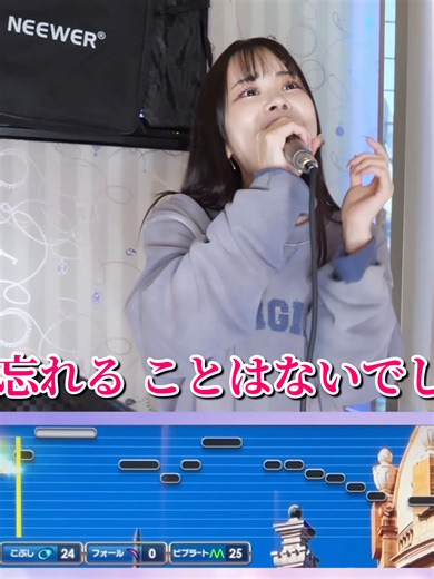 カラオケ採点チャレンジで99点獲得