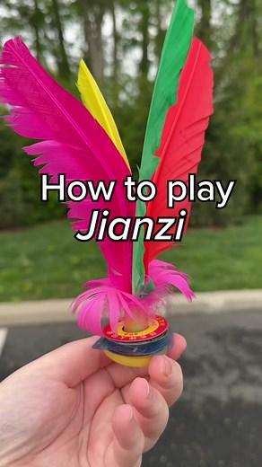 How to play Jianzi! #universalyums #subscriptionbox #snackbox #snacktok #fyp #internationalsnacks