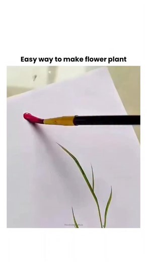 Theviralblendhub on Instagram: "The post features a 16-second video tutorial demonstrating a simple one-stroke brush technique to paint feathery pink cosmos flowers on paper, starting with green stems and fanning out petals for a vibrant, layered effect. As a repost from the @5min_crafts account, which curates unowned DIY content, it rapidly gained 286,000 views and enthusiastic replies praising its ease and beauty within 24 hours. This accessible art form supports mental health, with a 2016 Dre