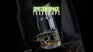 A Cosmic Eye Was Revealed Through the Lens of the Spitzer Space Telescope