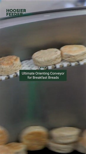 The holiday breakfast rush starts long before the oven. Our Ultimate Orienting Conveyor is designed to singulate and orient breakfast breads like biscuits, croissants, and English muffins, preparing them for efficient downstream processing. Built with sanitary design in mind, this system supports consistent orientation while keeping pace with high-volume bakery production. Whether it’s a seasonal spike or year-round demand, see how automation helps keep breakfast moving. Watch the full video her