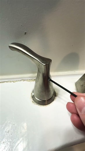 Loose sink handle causing hot water to stay on. Tightened, realigned, and fixed fast.
