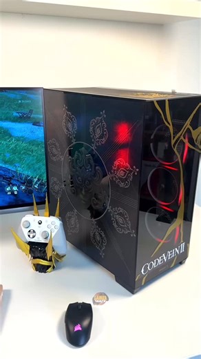 GAMER SNACK on Instagram‎: "Code Vein 2 custom PC 🤩 اصدار كمبيوتر العاب بتصمي لعبة كود فين ٢ و مجسم حامل ايدي التحكم بتصميم اللعبة. AMD Ryzen 7 7800X3D NVIDIA GeForce RTX 5070 32GB DDR5 MSI Pro B650-A WiFi DDR5 SSD 1TB Deepcool CG580 . #CodeVein2"‎