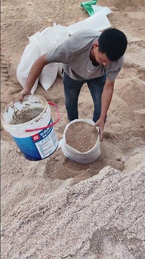 Sandsackspitze Stellen Sie den Beutel auf den Eimer, spart Energie!