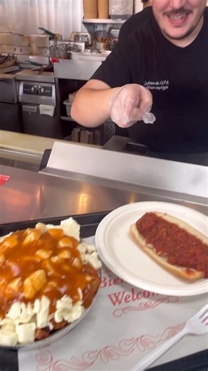 Poutine is happiness and this place made it even better at ALFA Hot-Dog Longueuil, QC Come check them out #cultinaryroadtrip #poutine #foodie #MichiganHotDogs #quebec #cheesecurds | Cultinary Road Trip