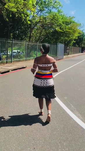 Cultural Elegance: Woman in Traditional African Dress