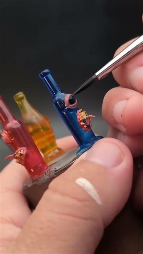 Paint the 3d printed mini clear bottles