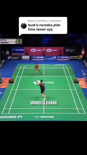 Intense Badminton Match Between Skilled Players