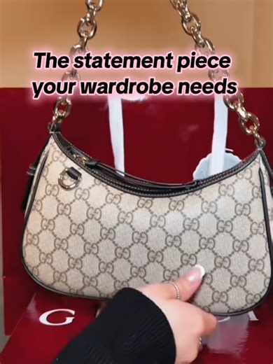 The Gucci GG Marmont Small Shoulder Bag in beige and black GG Supreme canvas — a timeless silhouette that defines understated luxury #guccimarmont #luxurybags #designerhandbags #guccibag #luxurystyle
