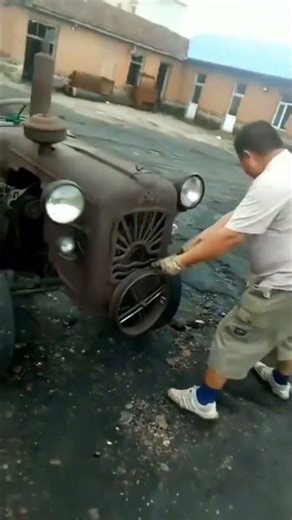 Cold starting skill for vintage tractors using a hand starter handle