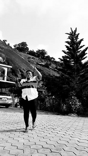 Outdoor Stroll: Walking in a Striped Shirt