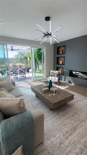 😮 WOW — this open floor plan is giving main character energy! The way the outside flows right in… those doors practically say, “We don’t believe in boundaries.” 🌿 And that huge kitchen island? It’s less of an island and more of a continent — perfect for snacks, parties, or pretending you’re on HGTV while chopping vegetables. 👩‍🍳✨ This is what gathering space goals look like — bright, open, and ready for every celebration (or Tuesday night takeout). 🍕🍷 Ready to find your own home that says 