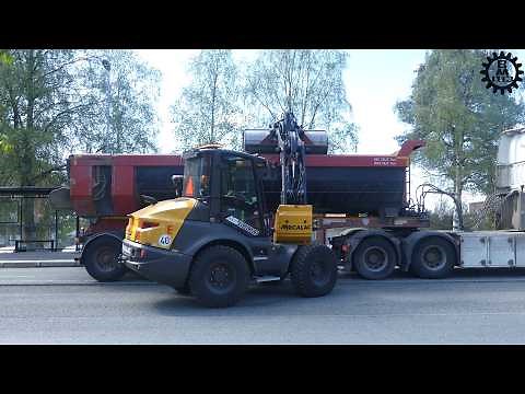 A cold milling asphalt pavement team in work with Wirtgen W210I & W50DC
