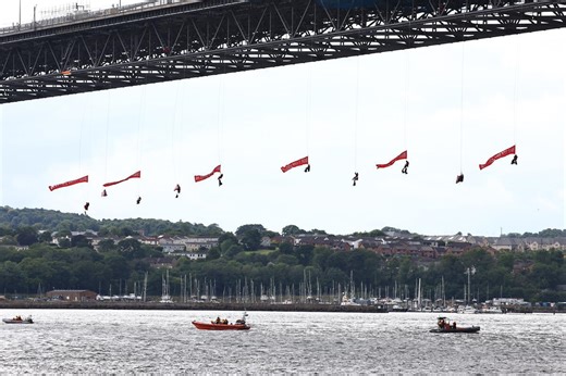 Greenpeace climbers abseil from Forth Bridge to block INEOS tanker in plastics protest - Greenpeace UK