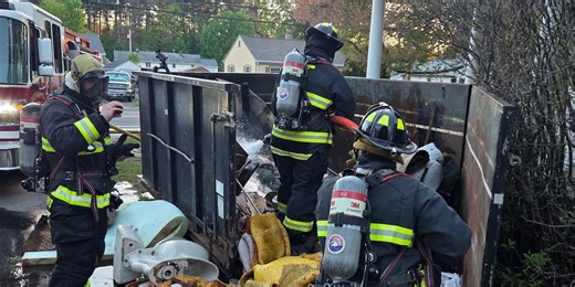 Emergency crews rush to put out dumpster fire 
